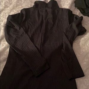 Above ankle black dress.